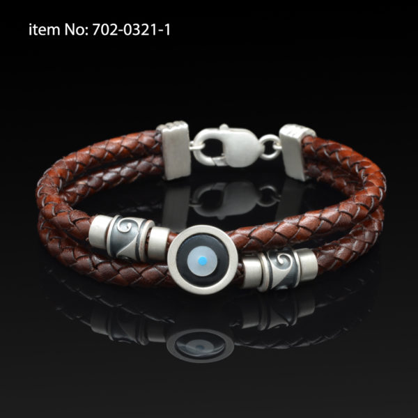 Sterling silver bracelet with lucky eye motif. Genuine braided black leather