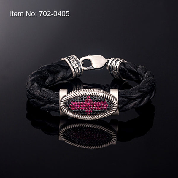 Sterling silver bracelet with zirgon stones set in motif 12 mm. Genuine braided leather