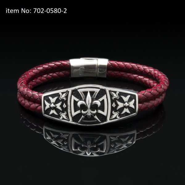 Sterling silver bracelet with Fleurs de lis and crosses motifs. Genuine braided red leather