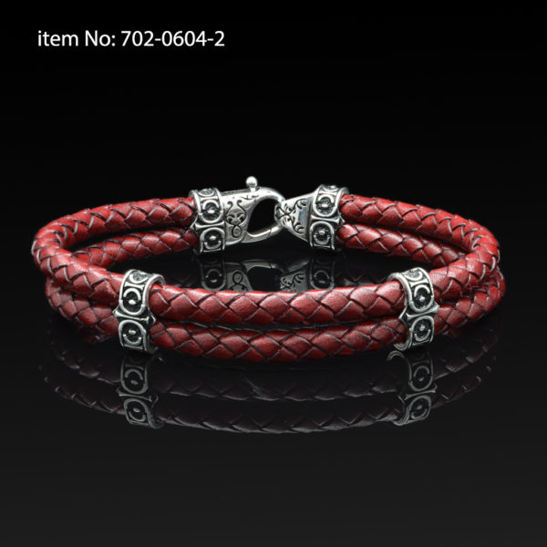 Sterling silver bracelet with Axion motif washers and braided red leather