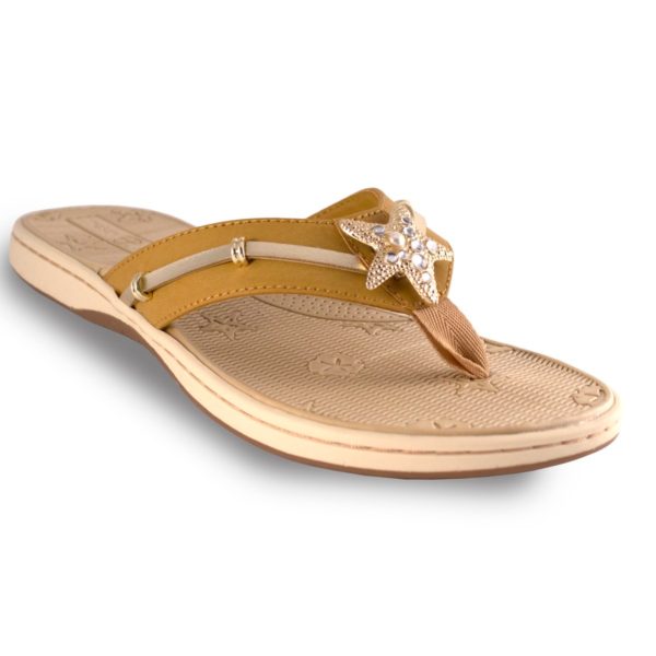 The Becca Tan is a molded EVA boat sandal with soft ribbon thong and a gold and crystals starfish signature snap.