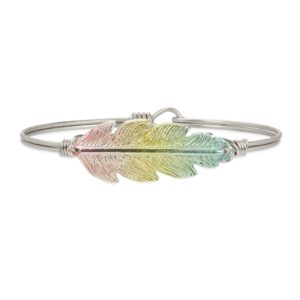 Lucky Feather Bangle Bracelet in Rainbow Mood-lifting color takes this fan favorite bracelet to new heights of fashion. This limited-edition piece is uniquely finished by a state-of-the-art plating process for a gorgeous pastel rainbow effect. handcrafted in the USA by luca + danni