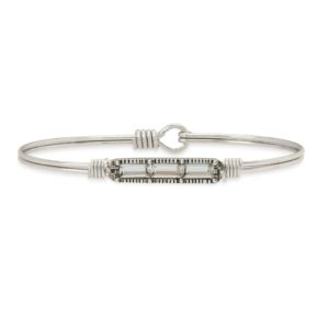 Mini Hudson Bangle Bracelet in Crystal It's the little things, don't you think? We scaled-down our bestselling Hudson design with a trio of extra-petite Swarovski® crystals, for a subtle dash of sparkle that's so right for stacking. handcrafted in the USA by luca + danni