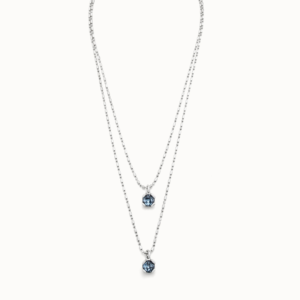 The Charismatic collection represents the ability to attract, captivate and influence everything around us, something that can only be achieved in a natural way. This is manifested in this necklace combined with two chains at different heights and two blue faceted crystals with adjustable carabiner clasp.