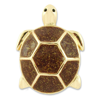 The Natalie Snap is a gold turtle with brown glitter enamel shell detail. lindsay phillips switch flops