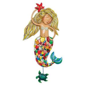 Sirena, our LARGE mermaid, is a beautiful statement piece! Her long, flowing hair, large rainbow tail, and striking features make her stand out. She is our largest design by far, and absolutely one of our very favorites! Introduced May 2021 Sirena (Large Mermaid) Clock From Allen Designs Beautiful statement piece with rainbow tail She holds a starfish above her long flowing hair Has a sea turtle pendulum that adds charming movement to every room Designed by Michelle Allen 30.5 in H x 3 in W x 15.5 in L